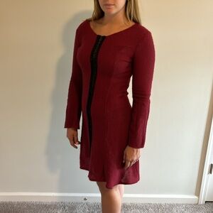 Red dress w black accent. Excellent condition.